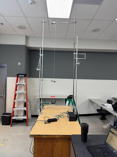 Simple Pendulum setup on demo table with appropriate rod placement and hanging pendulums.