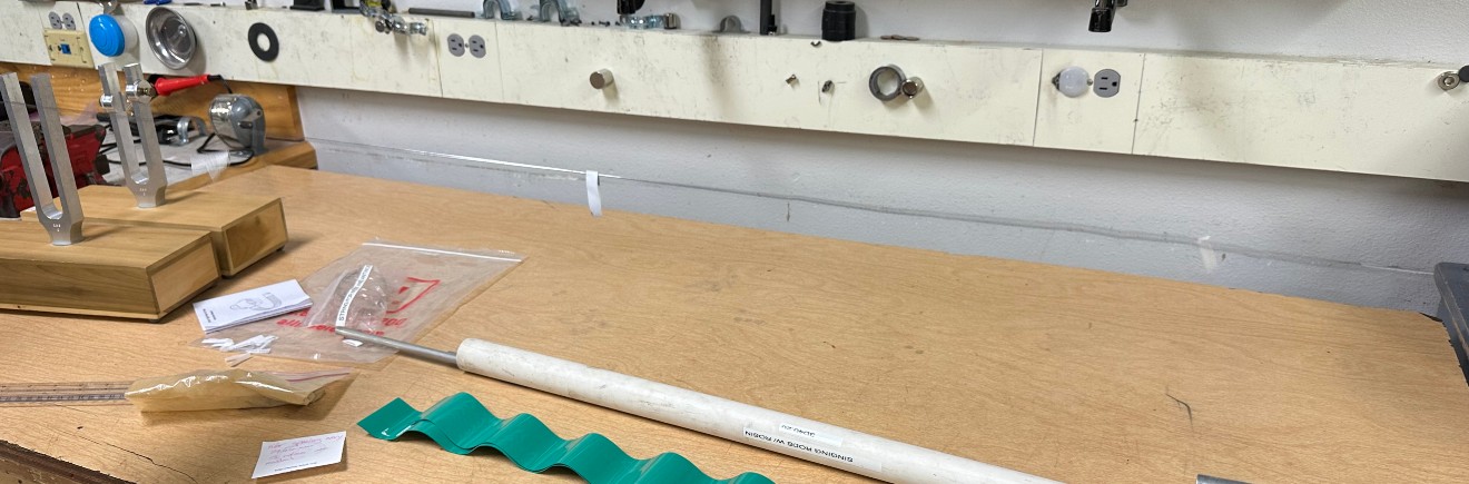A strip of paper jumping off a wire