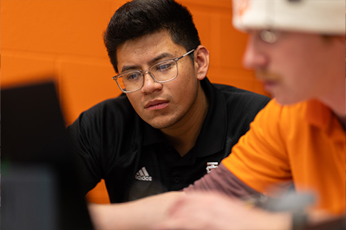 Instructor working with a student