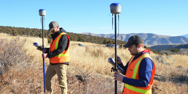 Surveying and Geomatics Engineering Technology Students working in the field
