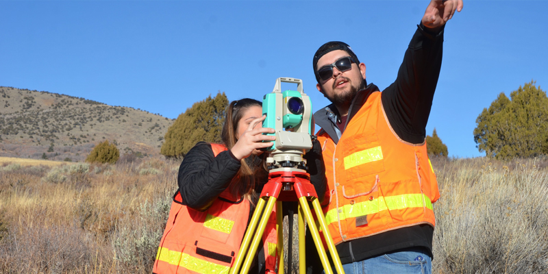 Surveying and Geomatics Engineering Technology Students working in the field 