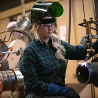 Welding student working in lab