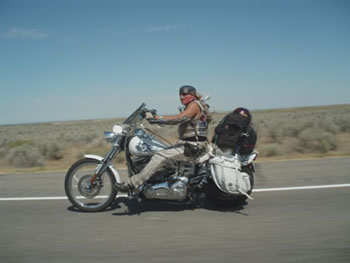 Glenna Young riding her Harley Davidson motorcycle