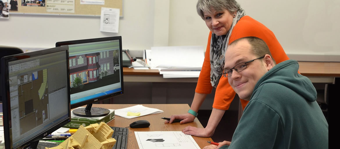 Alesha Churba helping a student in the CADD Lab