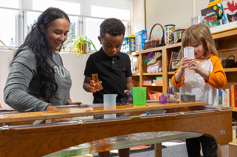 Early Childhood Care & Education Student working with children