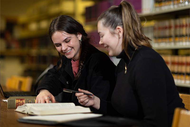 Paralegal Studies students workin in the library
