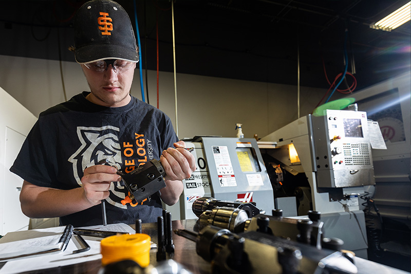 Computerized Machining student working in the shop