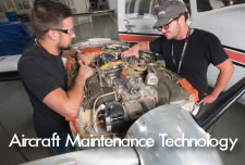 Aircraft Maintenance Technology Student working on an engine