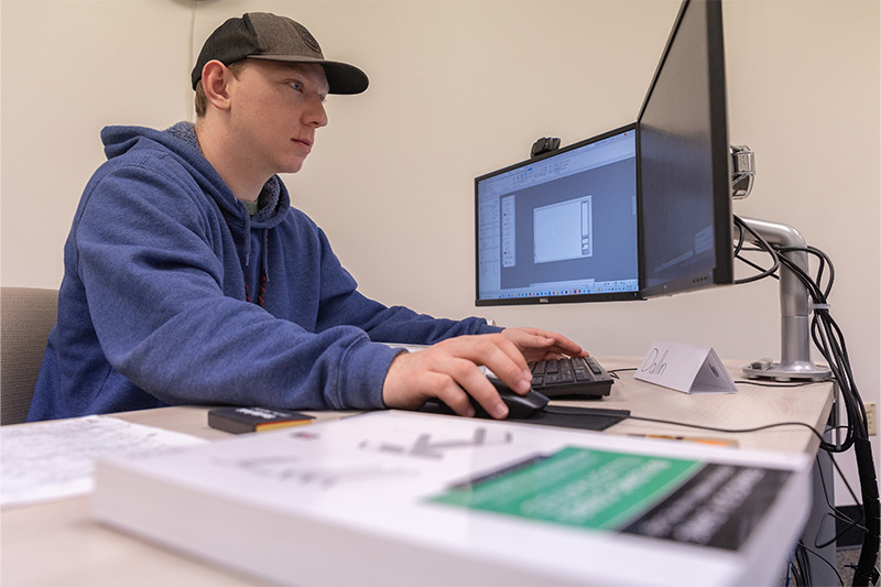 Computer Aided Design Drafting student working in the lab