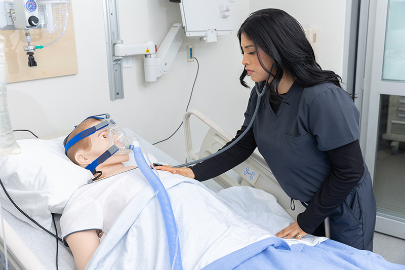 Respiratory Therapy student working in the simulation lab