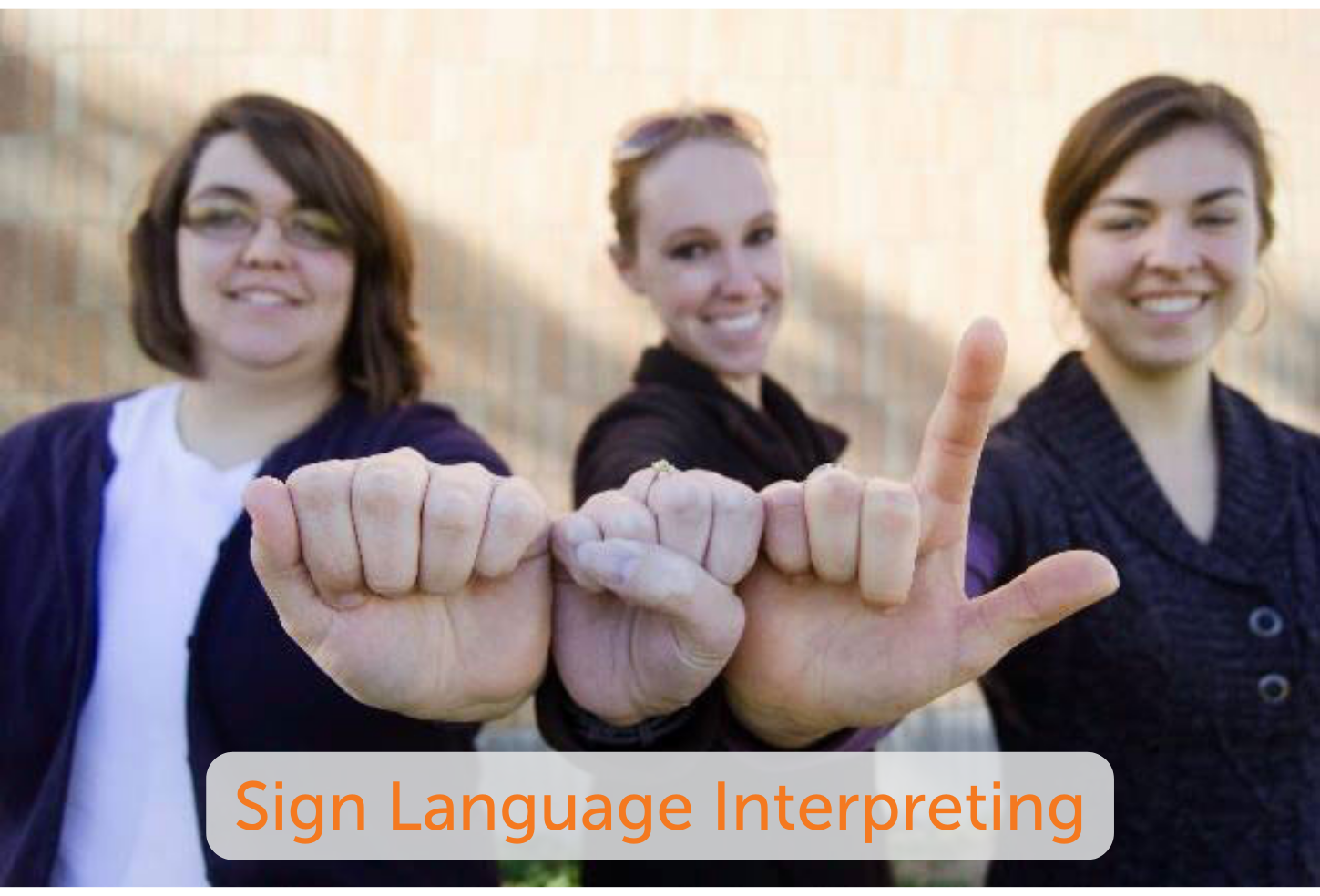 Sign language student practicing signs