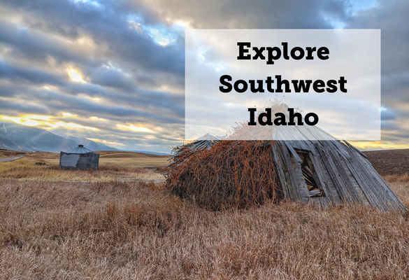 An old dilapidated farmhouse with illuminated clouds behind it. Text on image: Explore Southwest Idaho