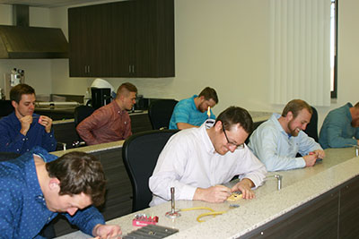 IDEP students working on dental prosthetics