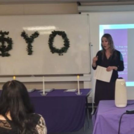Women talking with college honor society members about to initiate club in Arkansas via Zoom