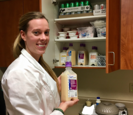 Dietetic intern washes hands after entering hospital room and before interacting with patient