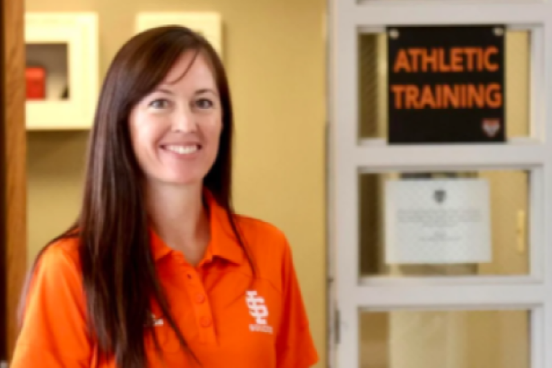 Female Sports Dietitian with long brown hair