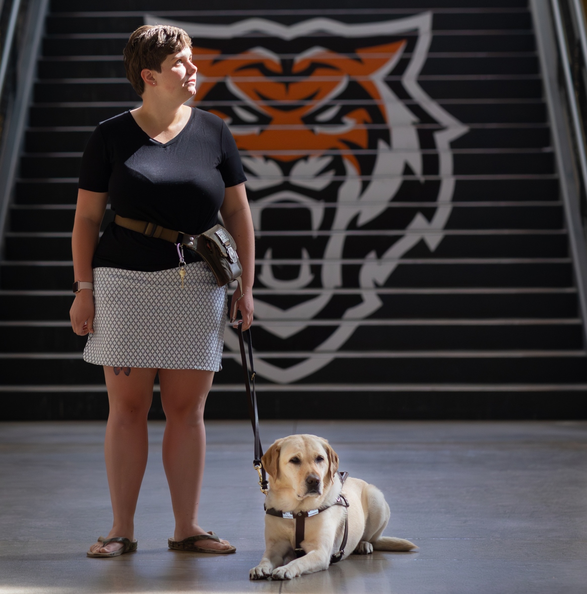 Quincie Mattick with her service dog Tessa.