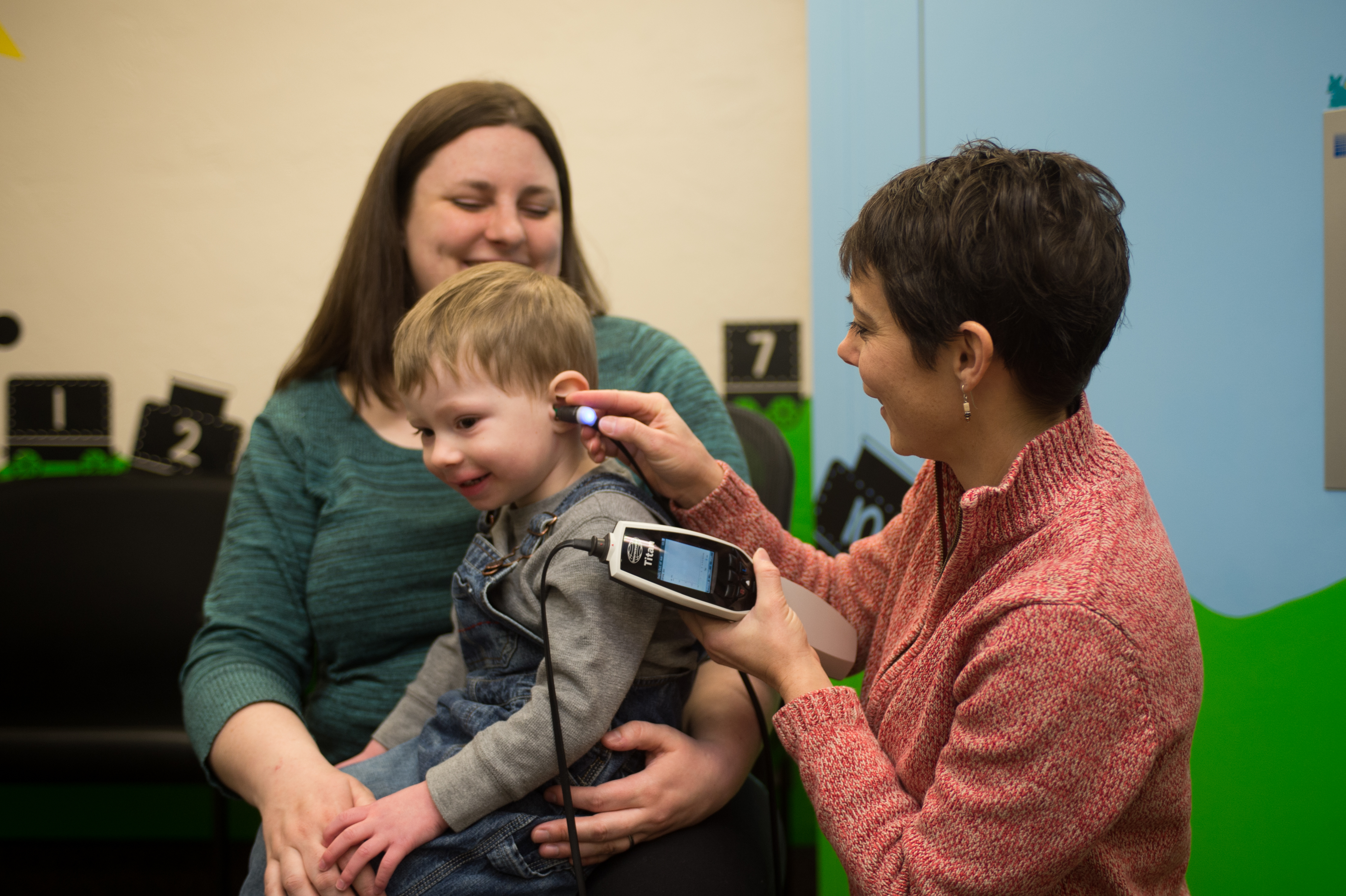 Young boy receives a hearing screening at ISU's Audiology Clinic