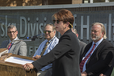 Dr. Linda Hatzenbuehler addresses a crowd