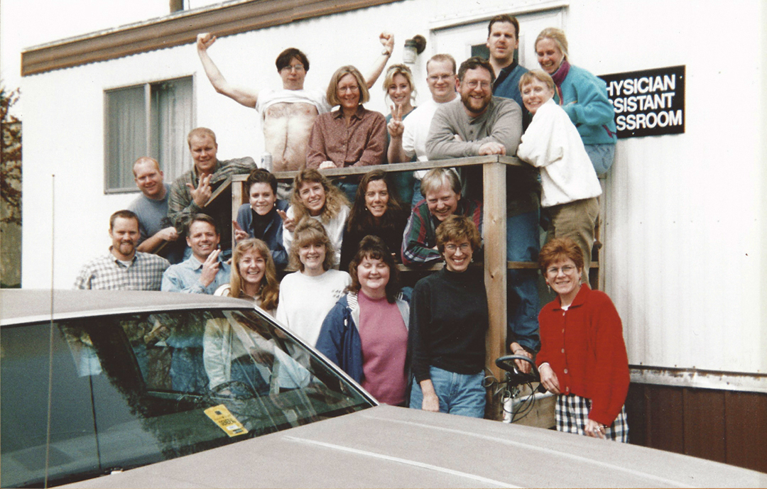 PA Studies Class of 1998 in front of their single wide trailer classroom