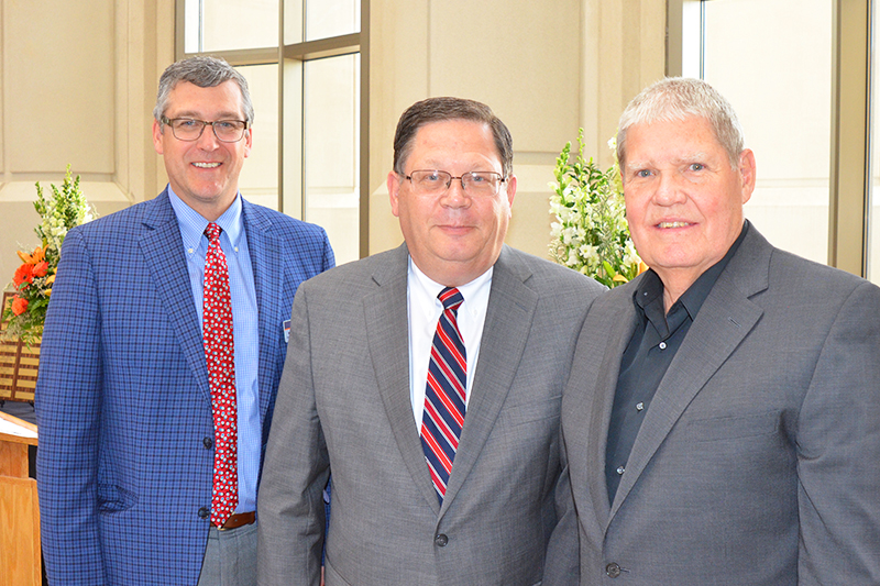 Dr. Rex Force awards the 2018 KDHS Vice President's Excellence Award to Dirk Driscoll and Wade Tolman during the KDHS Awards Reception on May 4, 2018