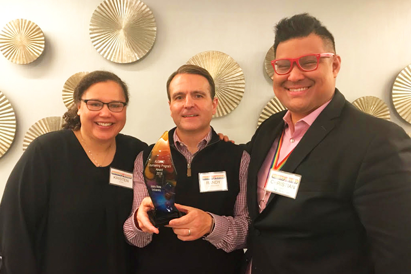 ISU faculty members (left to right) Dr. Kristen Lister, Dr. Randy Astramovich and Dr. Christian Chan accept the inaugural ALGBTIC award at the organization’s 2018 conference