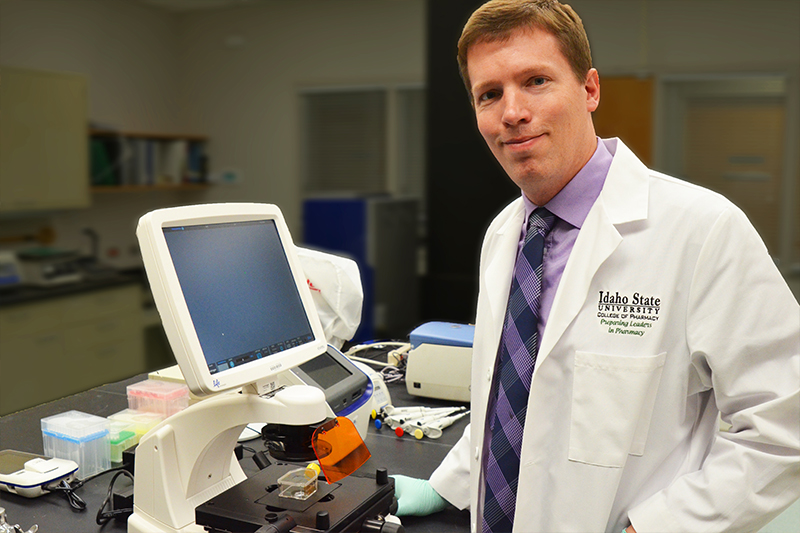 Dr. Jared Barrott in his lab where he is researching cancer drugs to treat rare tumors in children and teenagers