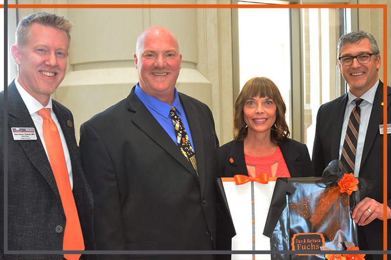 Dean Chris Owens with Dan & Barbara Fuchs, and Rex Force in the Stephens Performing Arts Center rotunda