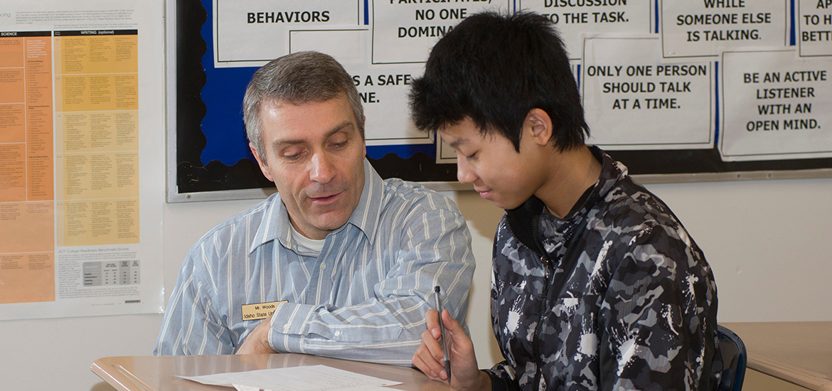 I S U student receiving help from a professor