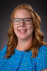 headshot of Corinna Percy