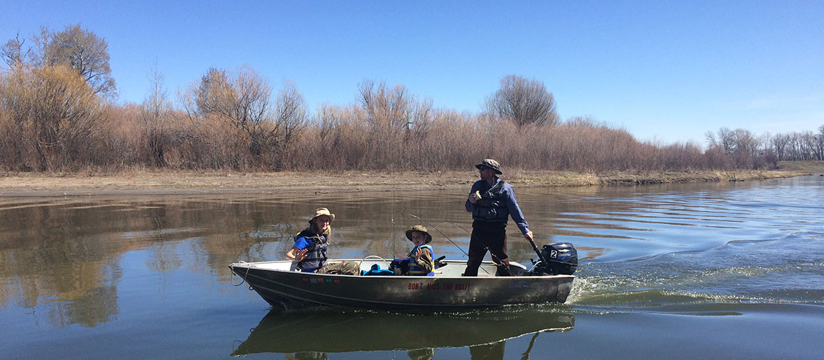 Family boating on a river