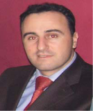 A headshot of Gazmend Qorraj