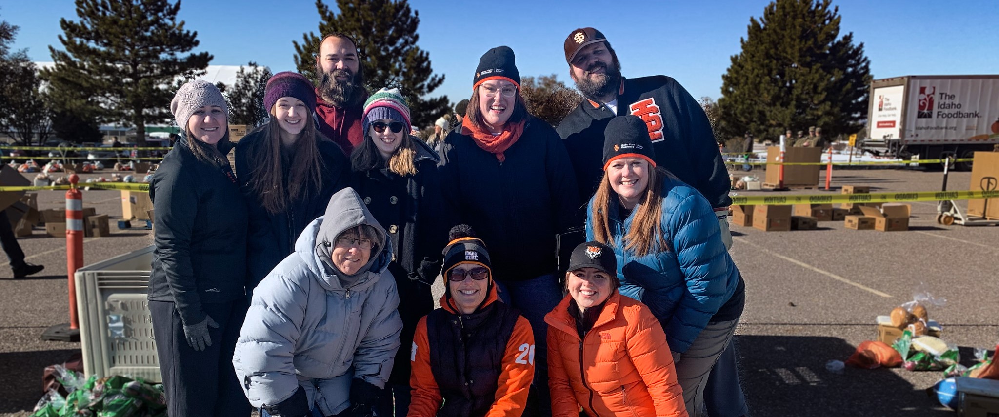 The graduate school staff group photo during their food bank volunteer day