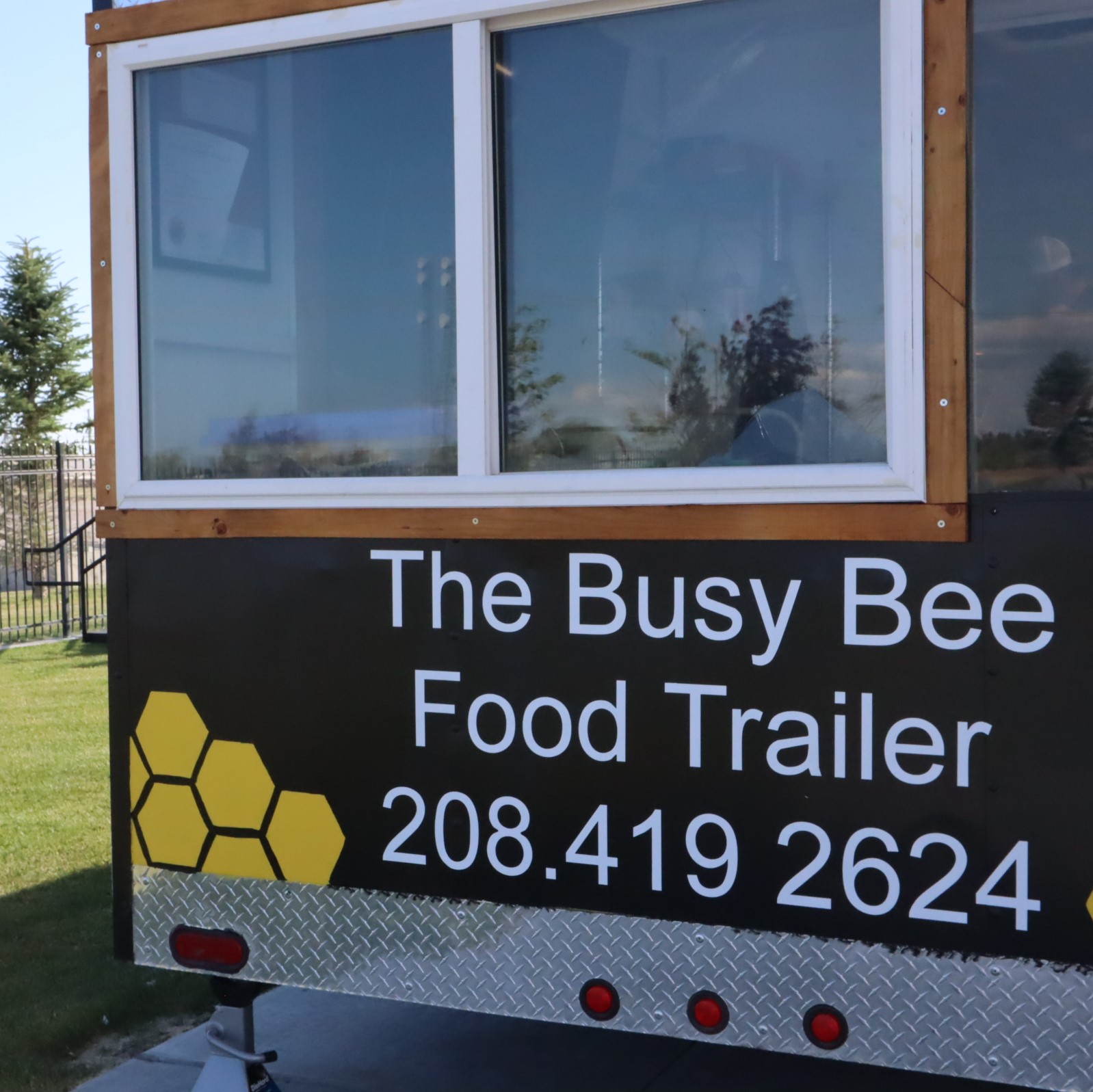picture of the back of the Busy Bee food truck, a caterer of summer nights