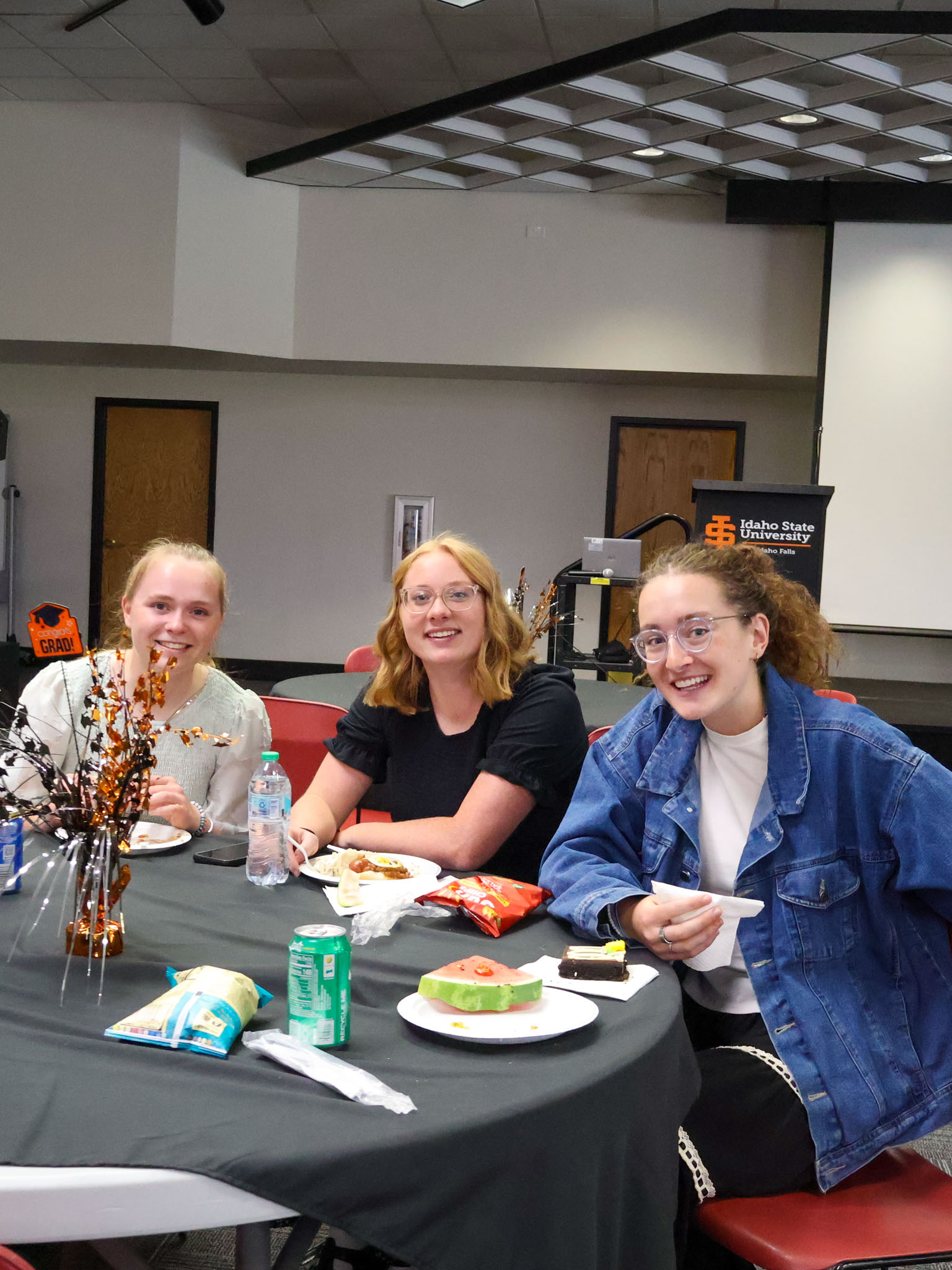 3 students at the 2026 spring semester graduation lunch