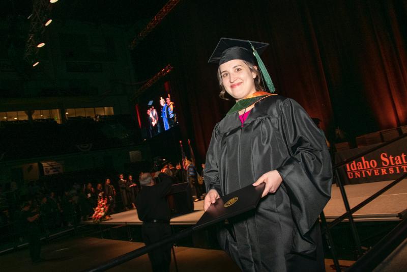 Student holding diploma