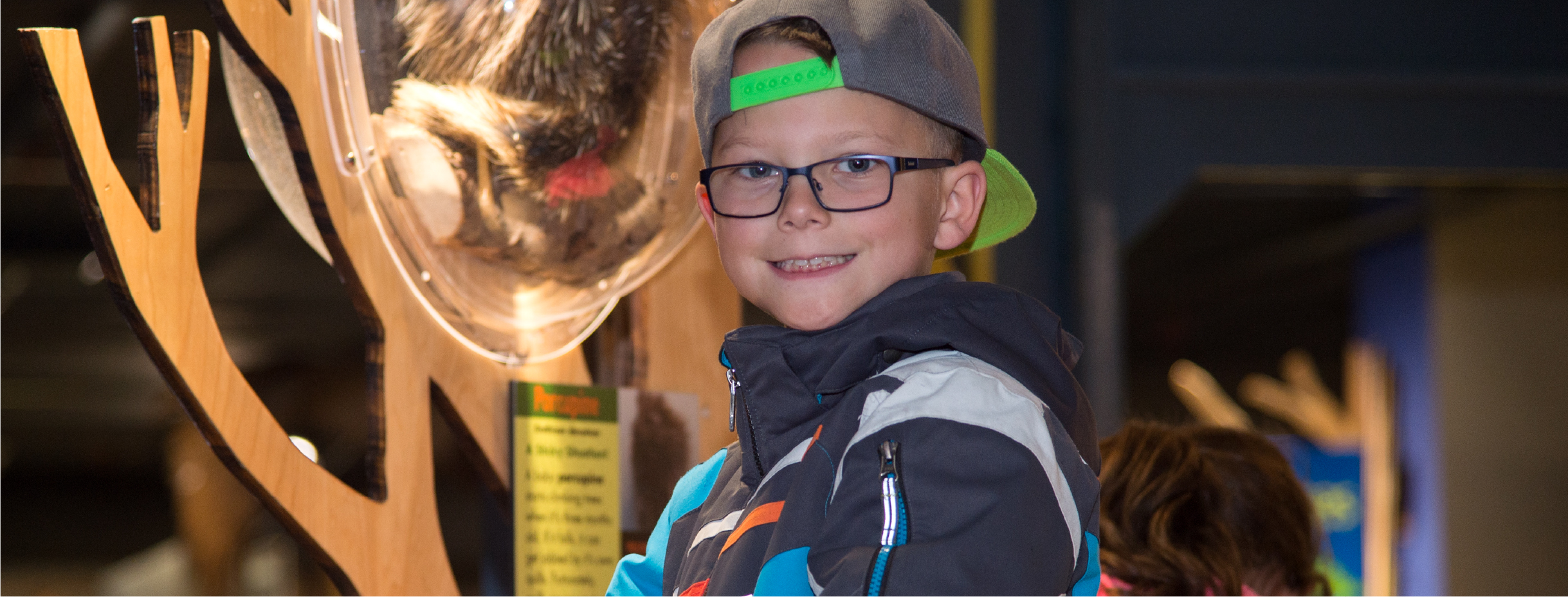 Young boy smiling at camera