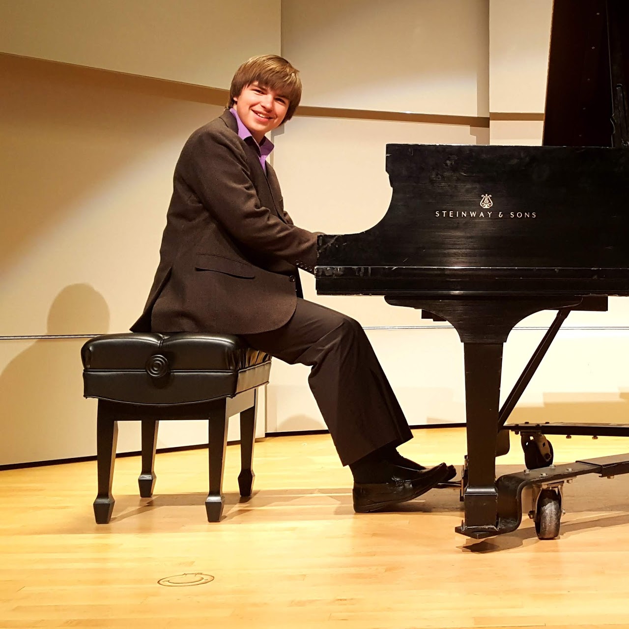 Student playing piano