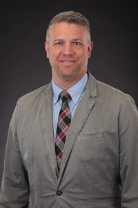Portrait of the interim AVP of enrollment, Corey Zink