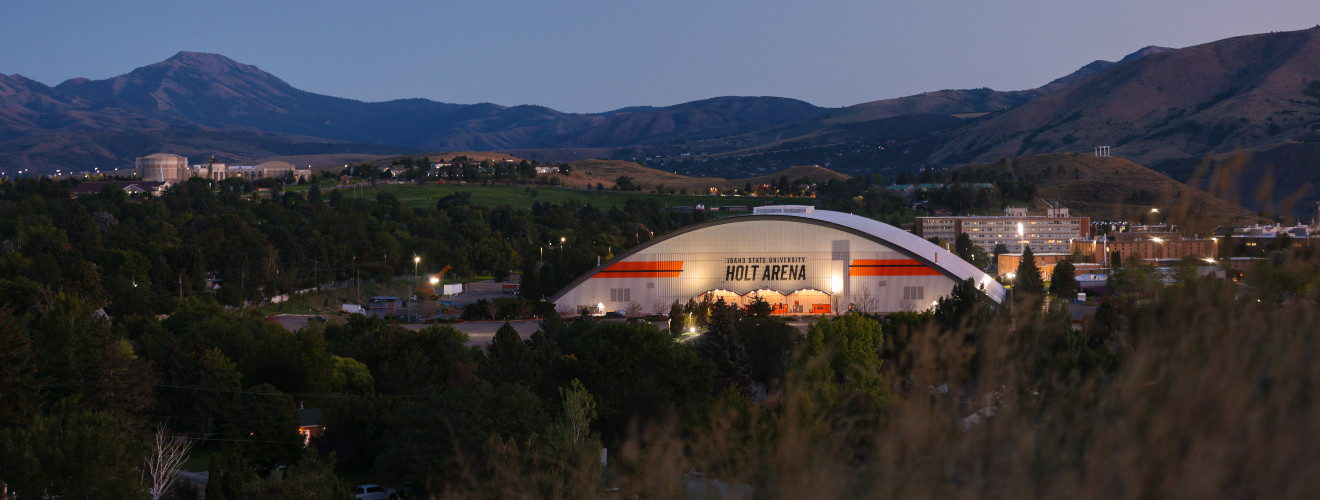The outside of ICCU Holt Arena at night