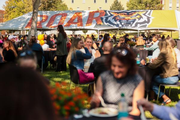 Staff and faculty enjoying food at the 2024 ISU Faculty and Staff Luncheon