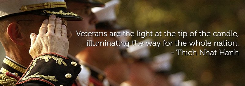 Image: A man in uniform holding a salute. Text: Veterans are the light at the tip of the candle, illuminating the way for the whole nation-Thich Nhat Hanh