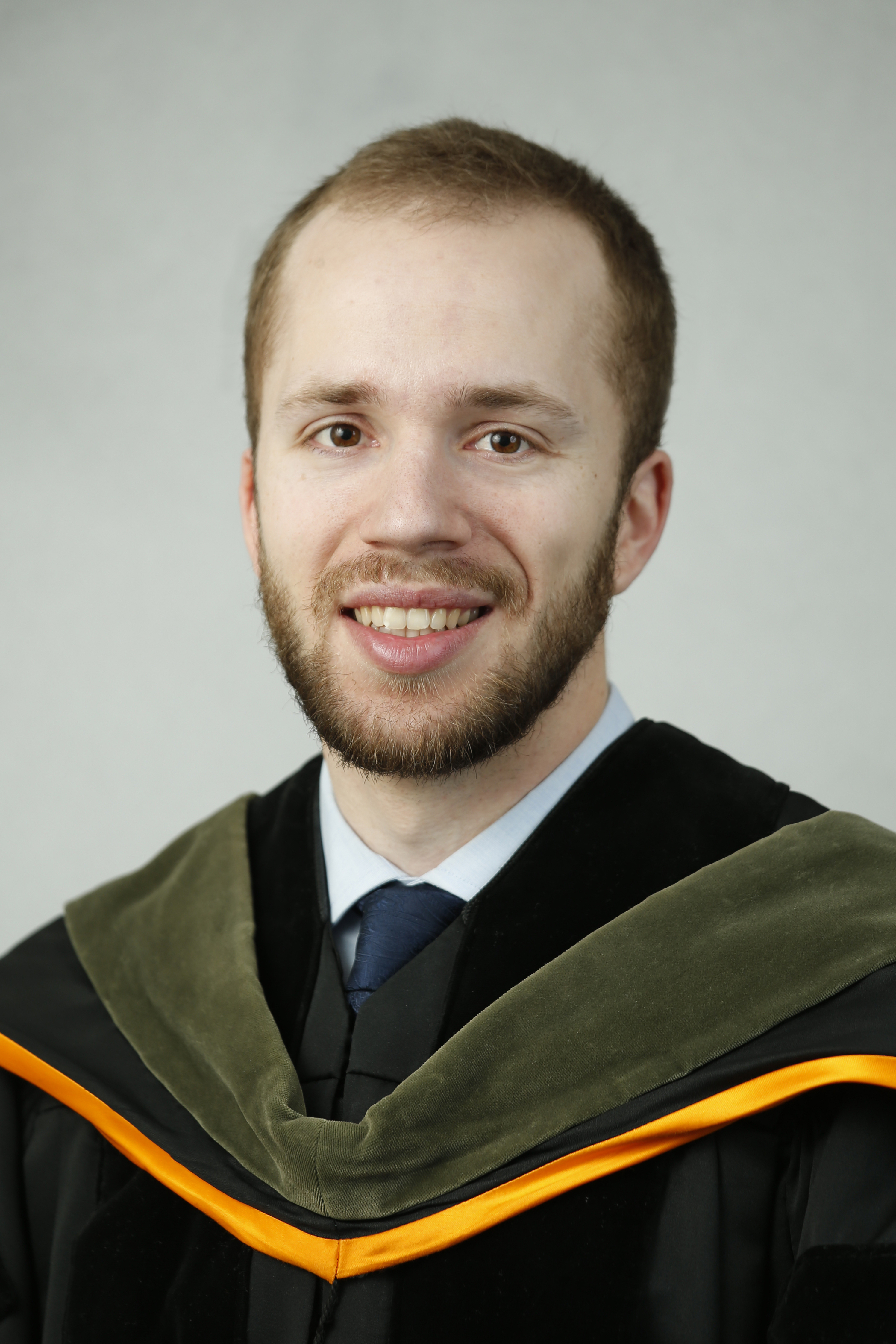 Alex Marinelli, Class of 2020 in commencement regalia