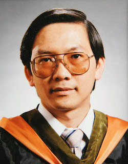 Quang Pham COP graduation photo