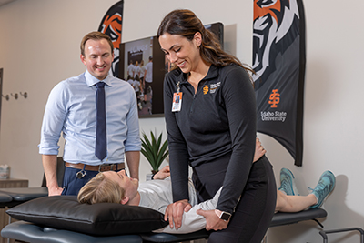 Student physical therapist provides treatment to a patient with supervisor evaluating