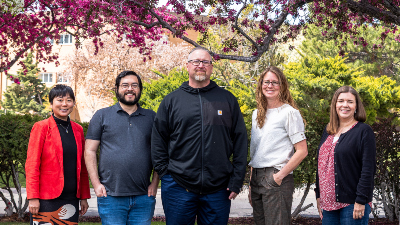Psychology Undergraduate Committee in front of tree