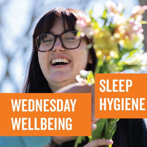 Smiling student with flower. Wednesday Wellbeing Sleep Hygiene