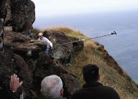 John on an island with scientific instrument