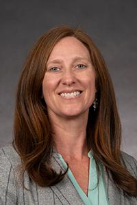 A headshot of professor Heather Ray