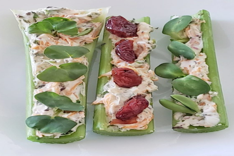 celery stuffed with cream cheese and microgreens